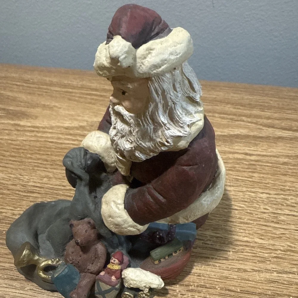 Santa Figurine Pulling‎ Toys Out Of A Sack